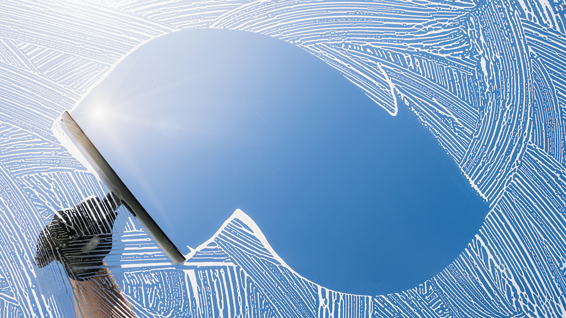 A close up of a toothbrush and a mirror